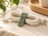 DESKFLOW Cable Clips & Ties Set concept: Gather spare cable length with a tie. AI concept visual; styling props not included.