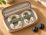 DESKFLOW Cable Clips & Ties Set concept: Pack gathered cables in a travel pouch — pouch not included. AI concept visual; styling props not included.