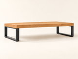 DESKFLOW Oak Desk Essentials concept: Riser side profile and leg detail. AI concept visual; styling props not included.